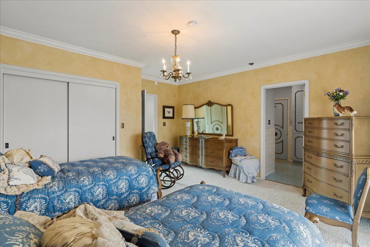 1215 Camino Ramon San Jose, CA 95125 - Photo 46 of 76 a bedroom with a bed and wooden floor