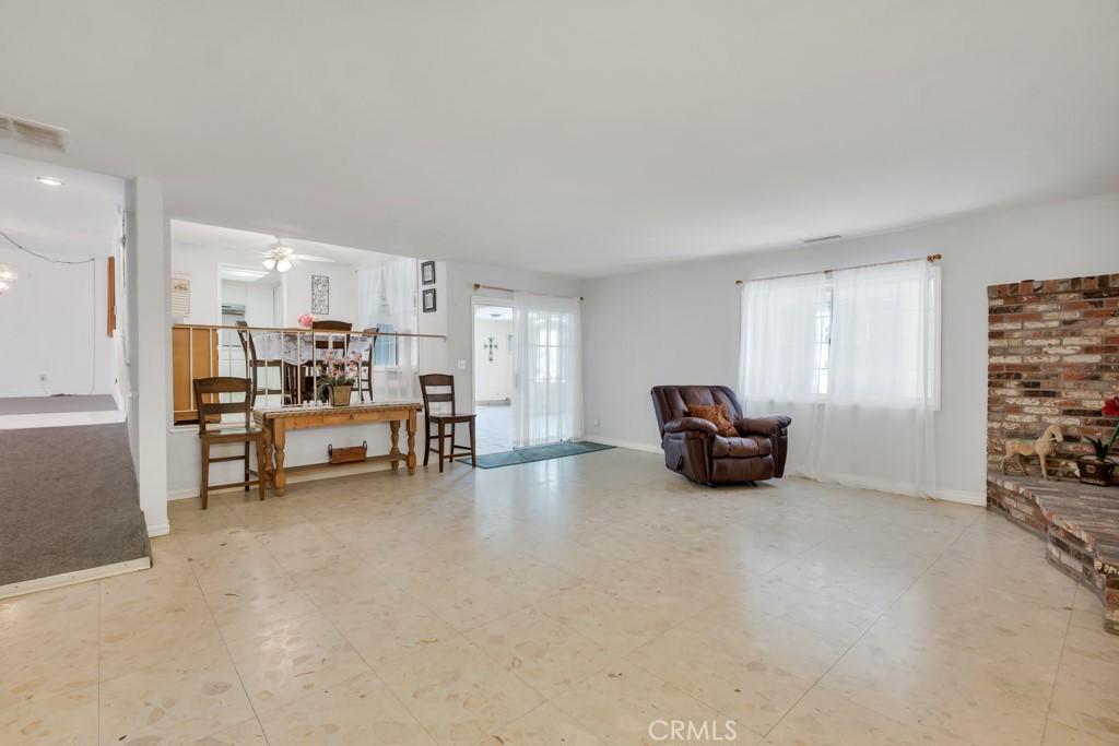 14024 Tyler Street Sylmar, CA 91342 - Photo 18 of 50 a living room with furniture and a couch