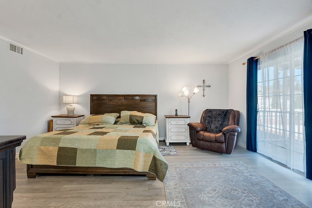 14024 Tyler Street Sylmar, CA 91342 - Photo 23 of 50 a bedroom with a bed and couch