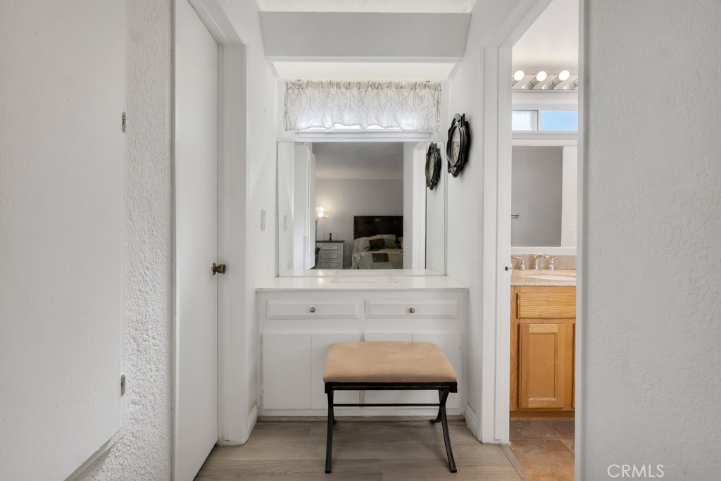 14024 Tyler Street Sylmar, CA 91342 - Photo 25 of 50 a bathroom with a mirror and a sink