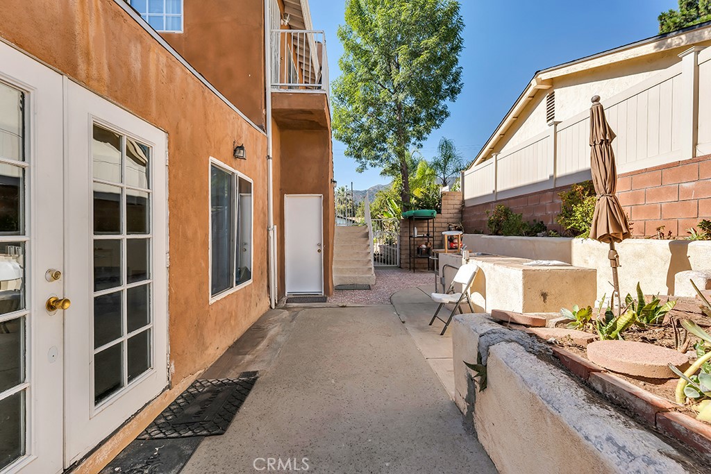 14024 Tyler Street Sylmar, CA 91342 - Photo 34 of 50 a view of a house with a patio