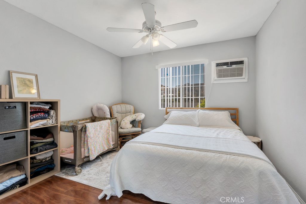 14024 Tyler Street Sylmar, CA 91342 - Photo 43 of 50 a bedroom with bed and window