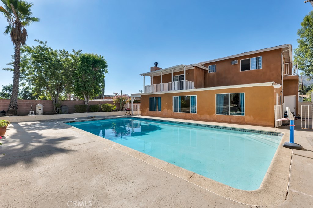 14024 Tyler Street Sylmar, CA 91342 - Photo 45 of 50 a front view of a house with a yard