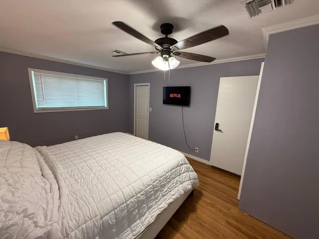 a view of backyard of house with seating space