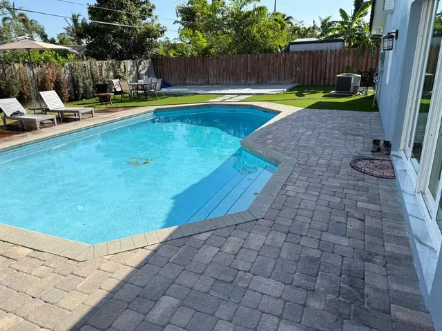 a table and chairs in a kitchen