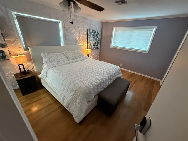 a view of a backyard with sitting area