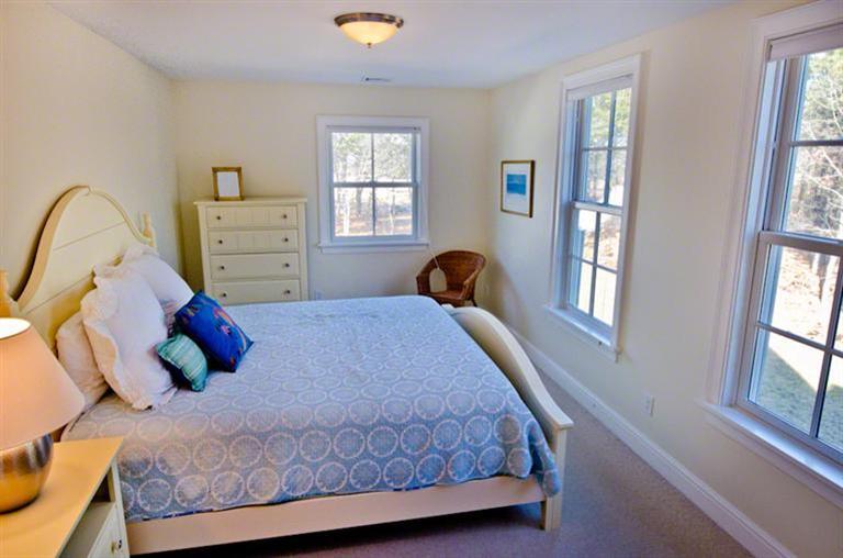4 Magnolia Way Edgartown, MA 02539 - Photo 16 of 23 a bedroom with a bed and window