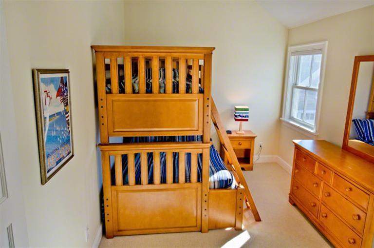 4 Magnolia Way Edgartown, MA 02539 - Photo 19 of 23 a view of an entryway with a small yard