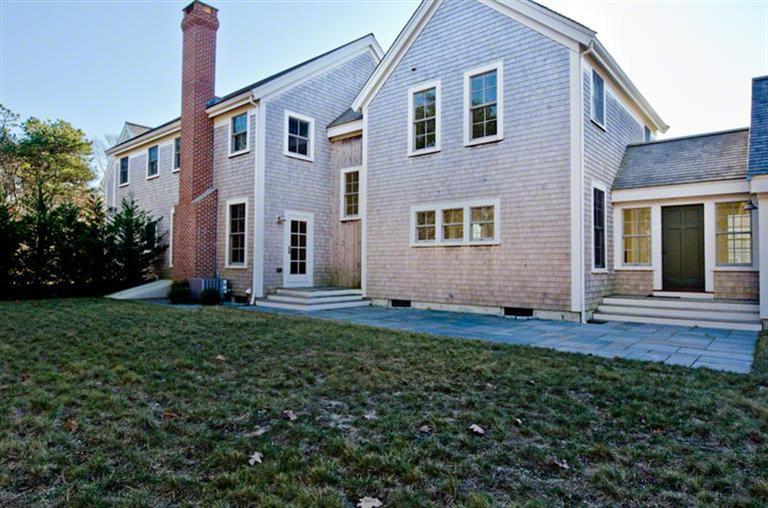 4 Magnolia Way Edgartown, MA 02539 - Photo 23 of 23 a view of a house with backyard and garden
