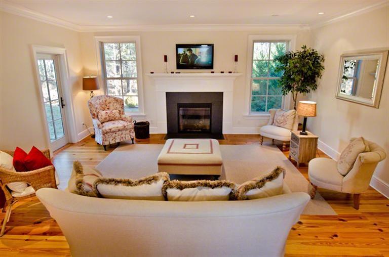 4 Magnolia Way Edgartown, MA 02539 - Photo 3 of 23 a living room with furniture and a fireplace