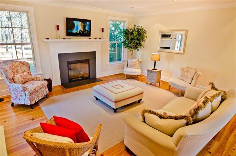 4 Magnolia Way Edgartown, MA 02539 - Photo 4 of 23 a living room with furniture and a fireplace