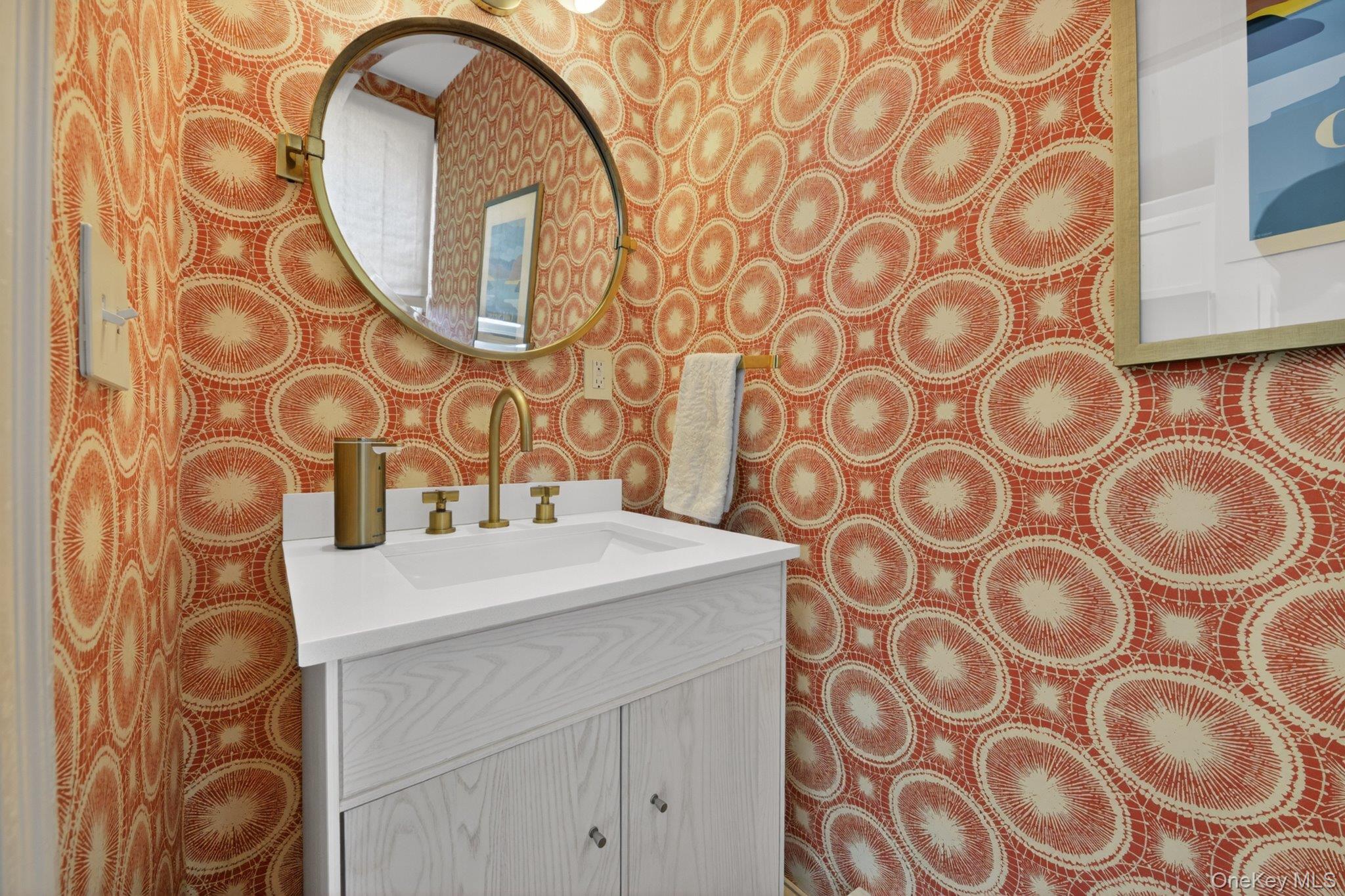 16 Chestnut Street Cold Spring, NY 10516 - Photo 19 of 50 Half bath with graphic and colorful wallpaper