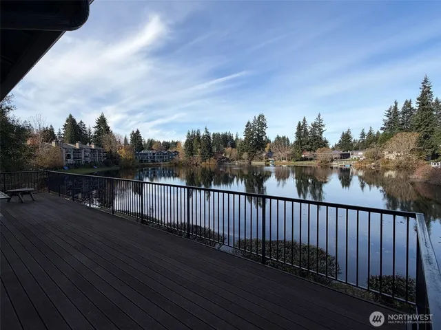 a balcony with wooden floor