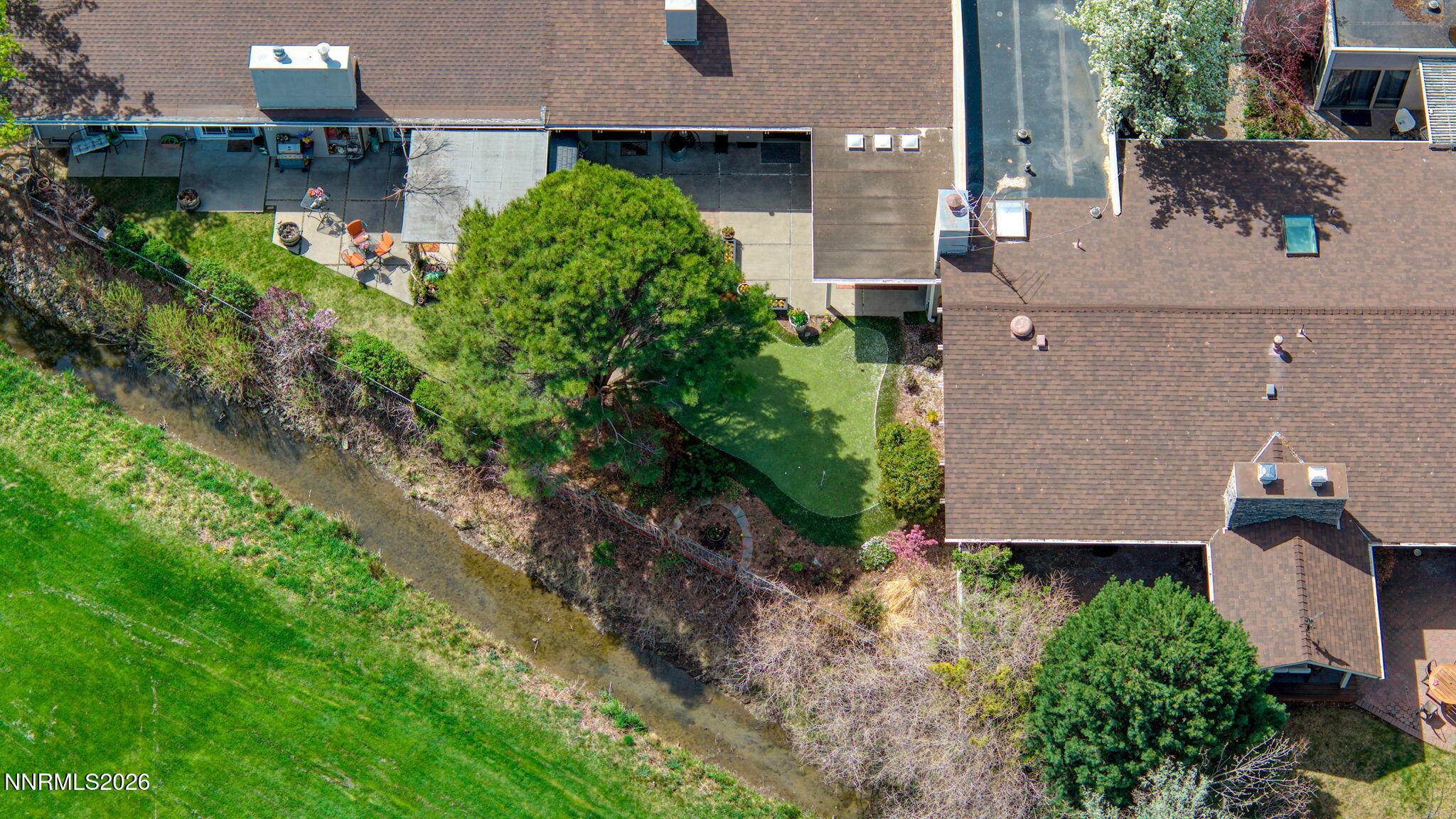 4920 Plumas Street Reno, NV 89509 - Photo 36 of 36 an aerial view of multiple houses with a yard