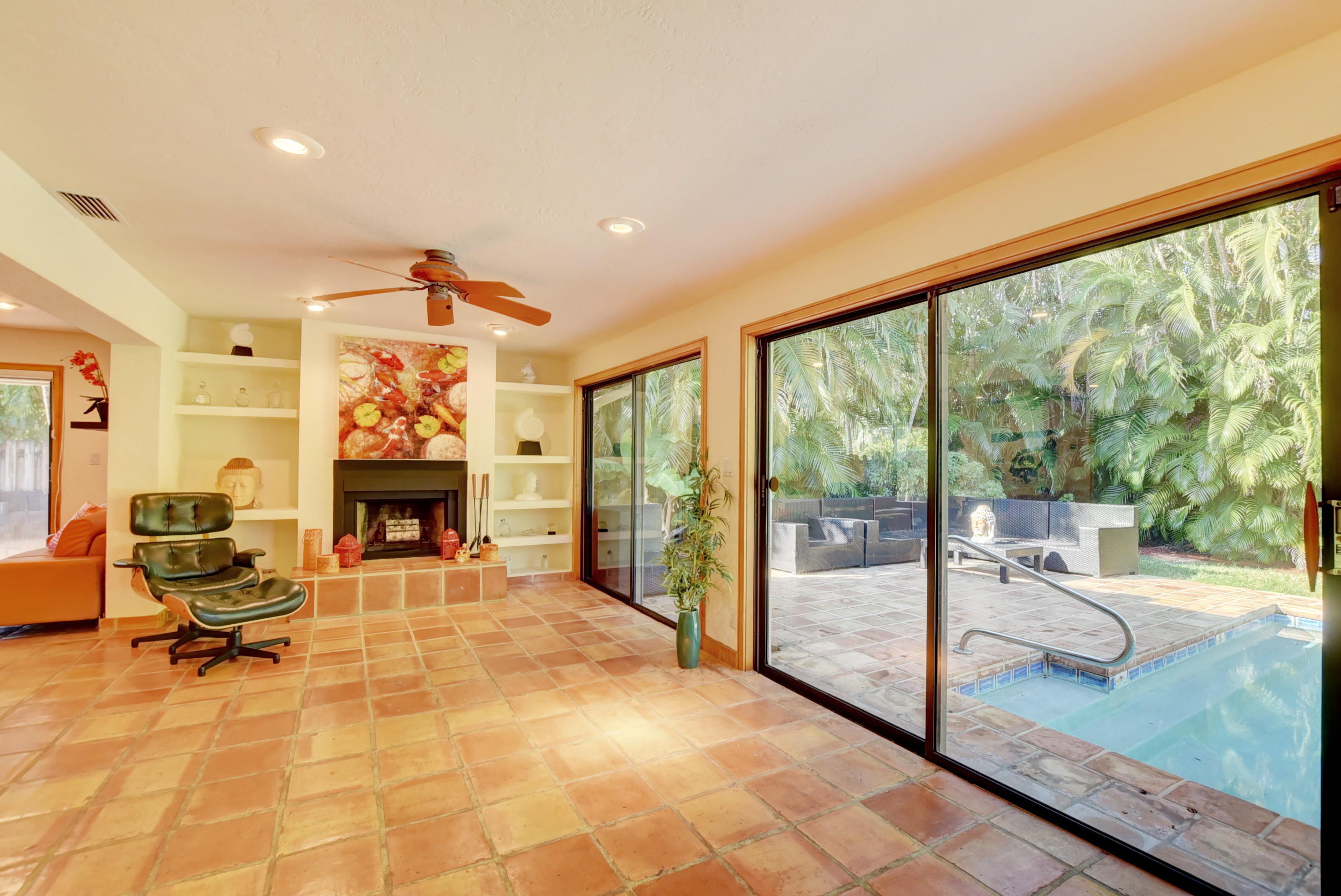 6761 Entrada Place Boca Raton, FL 33433 - Photo 20 of 69 a living room with fireplace furniture and a floor to ceiling window