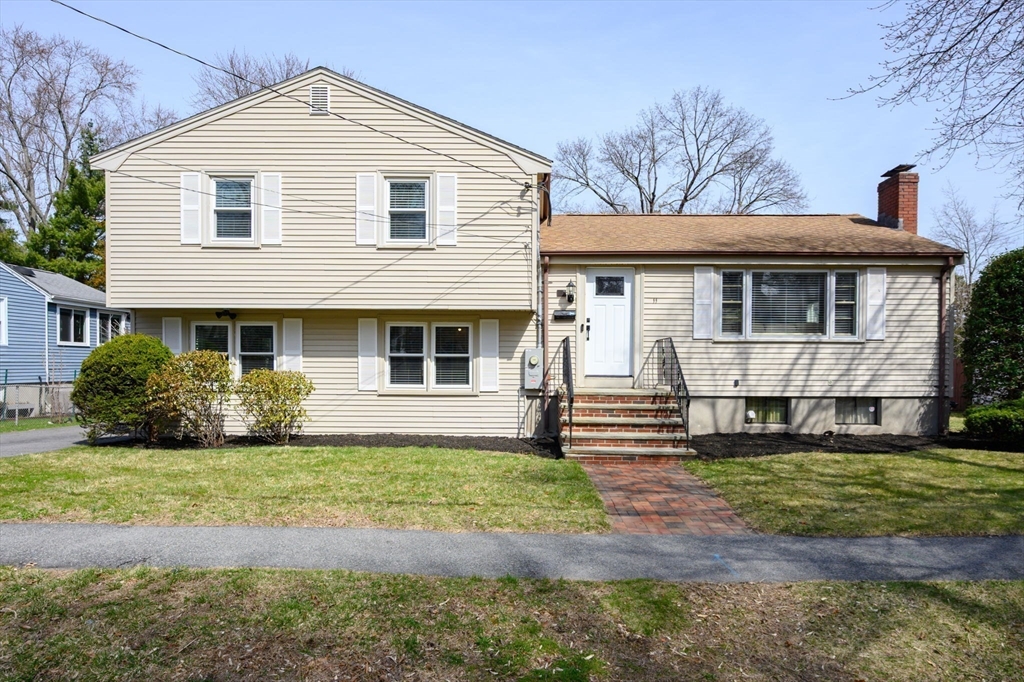 11 Christopher Drive Milton, MA 02186 - Photo 1 of 1 a front view of a house with a yard