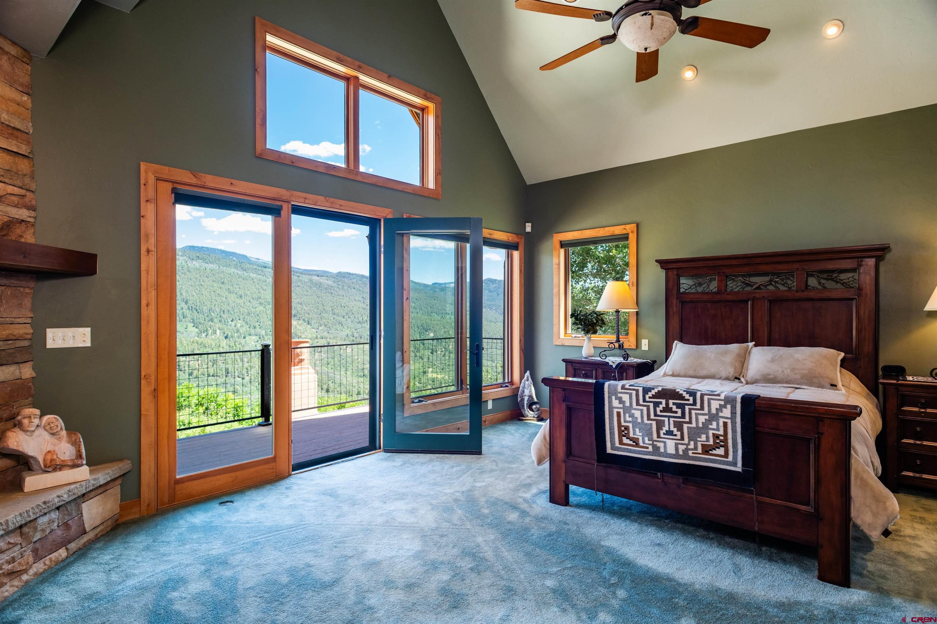 2550 Destination Ranch Road Durango, CO 81301 - Photo 18 of 45 a bed sitting in a room next to a window