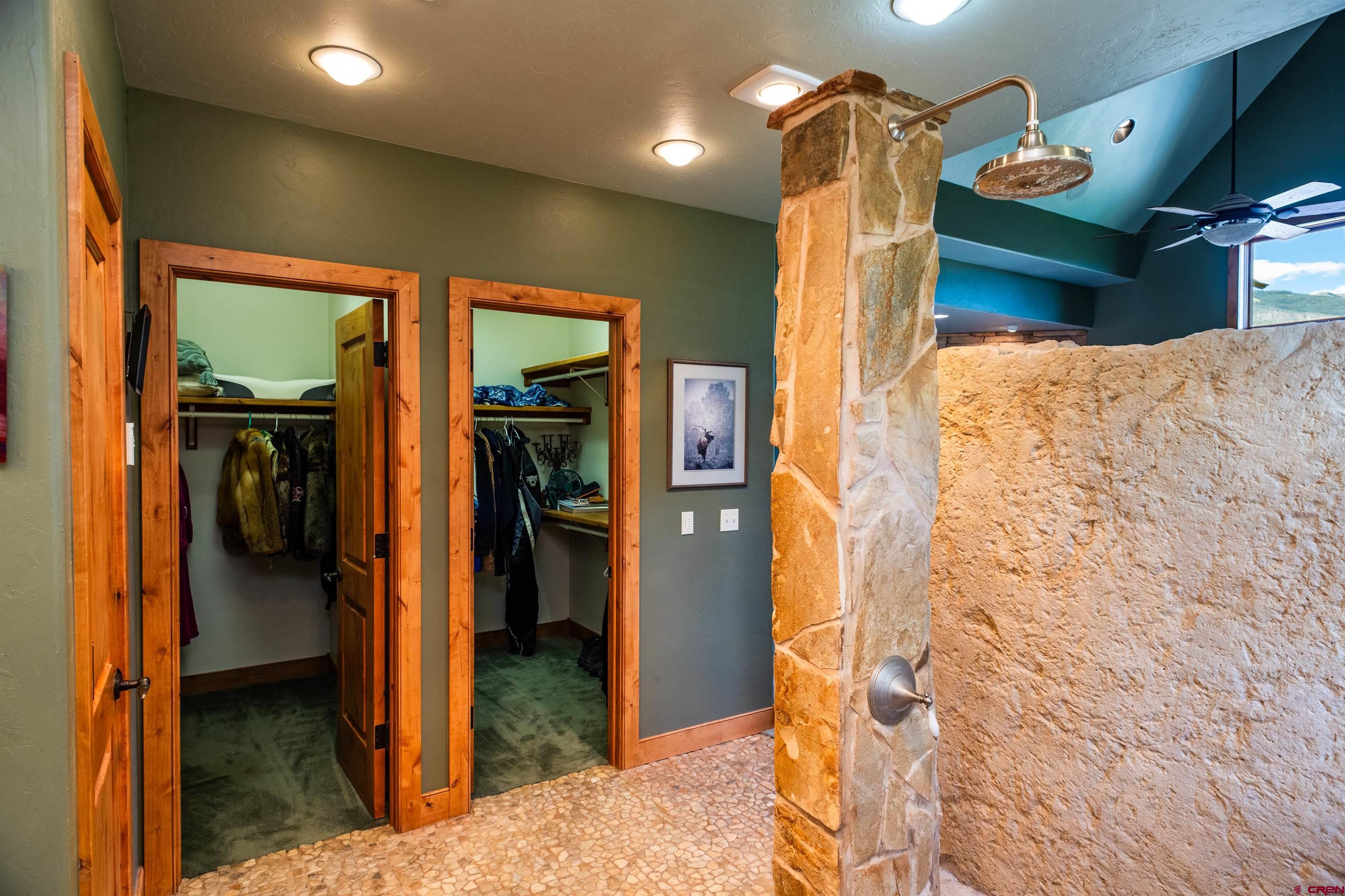 2550 Destination Ranch Road Durango, CO 81301 - Photo 23 of 45 a bedroom with a bed and a view of bathroom