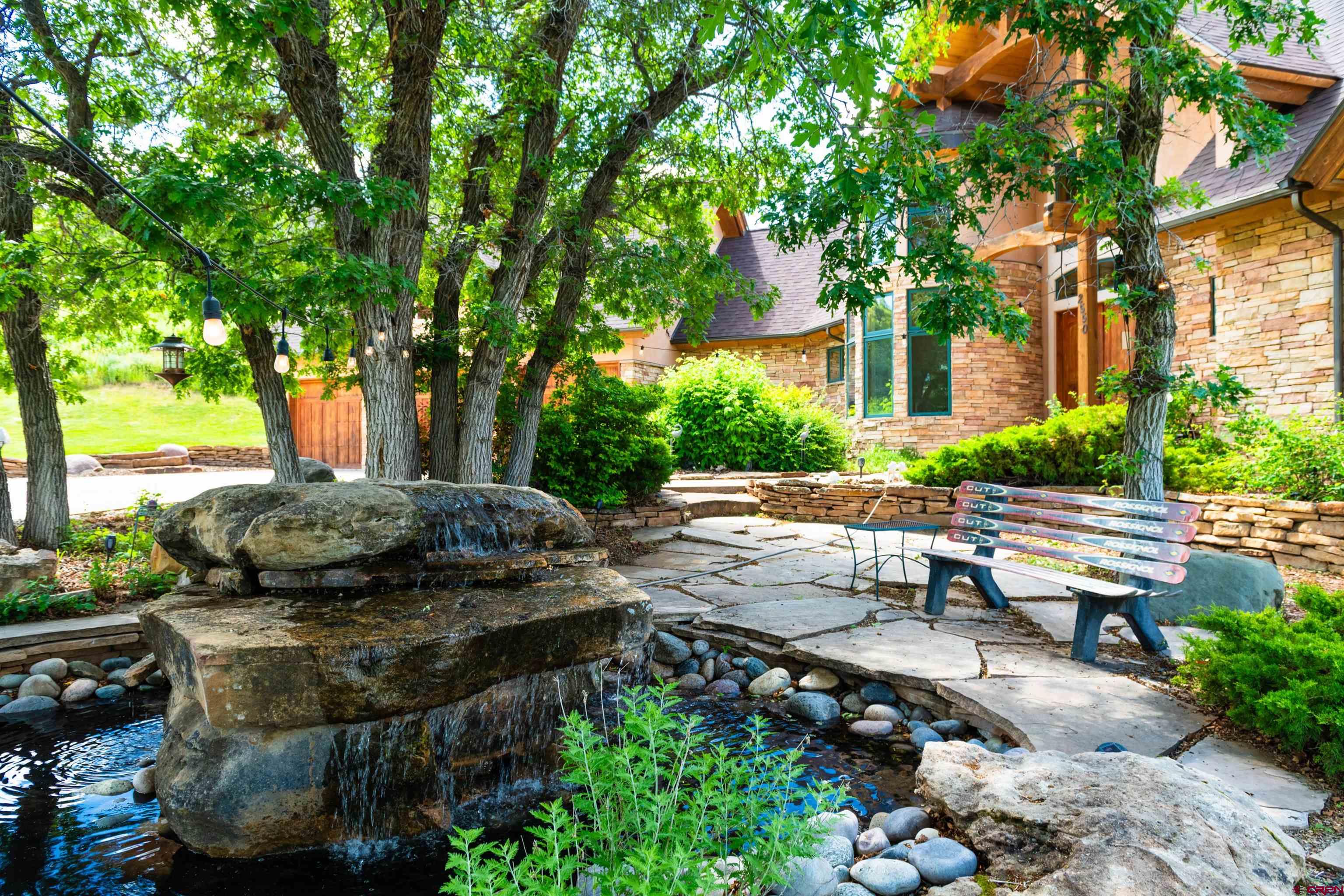 2550 Destination Ranch Road Durango, CO 81301 - Photo 27 of 45 a view of a backyard with sitting area