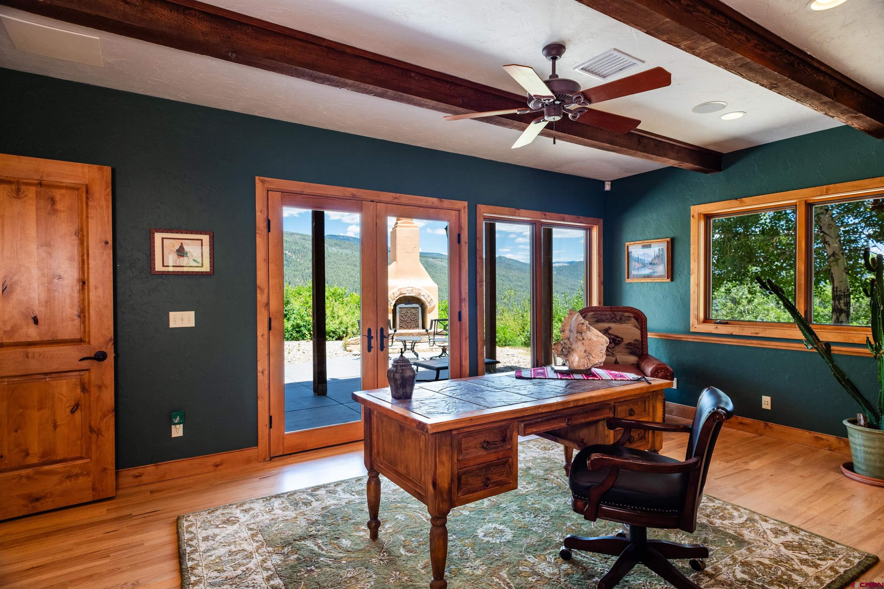2550 Destination Ranch Road Durango, CO 81301 - Photo 30 of 45 a living room with furniture and a large window