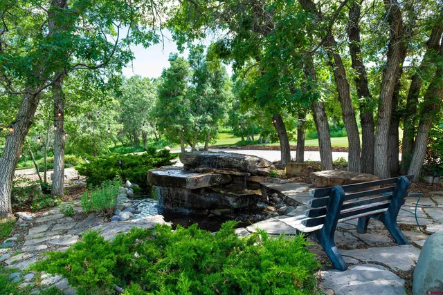 a view of a garden with patio