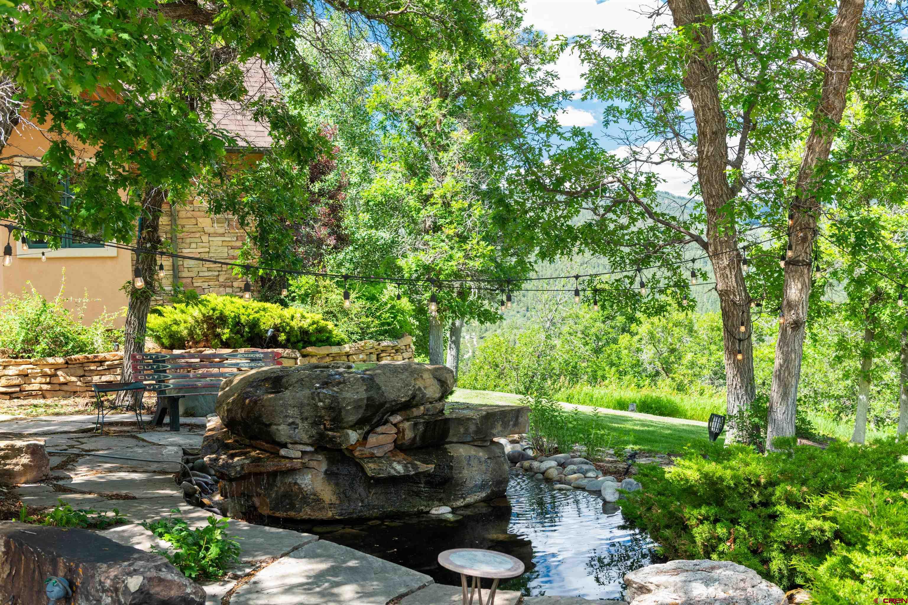 2550 Destination Ranch Road Durango, CO 81301 - Photo 35 of 45 a view of a garden with patio