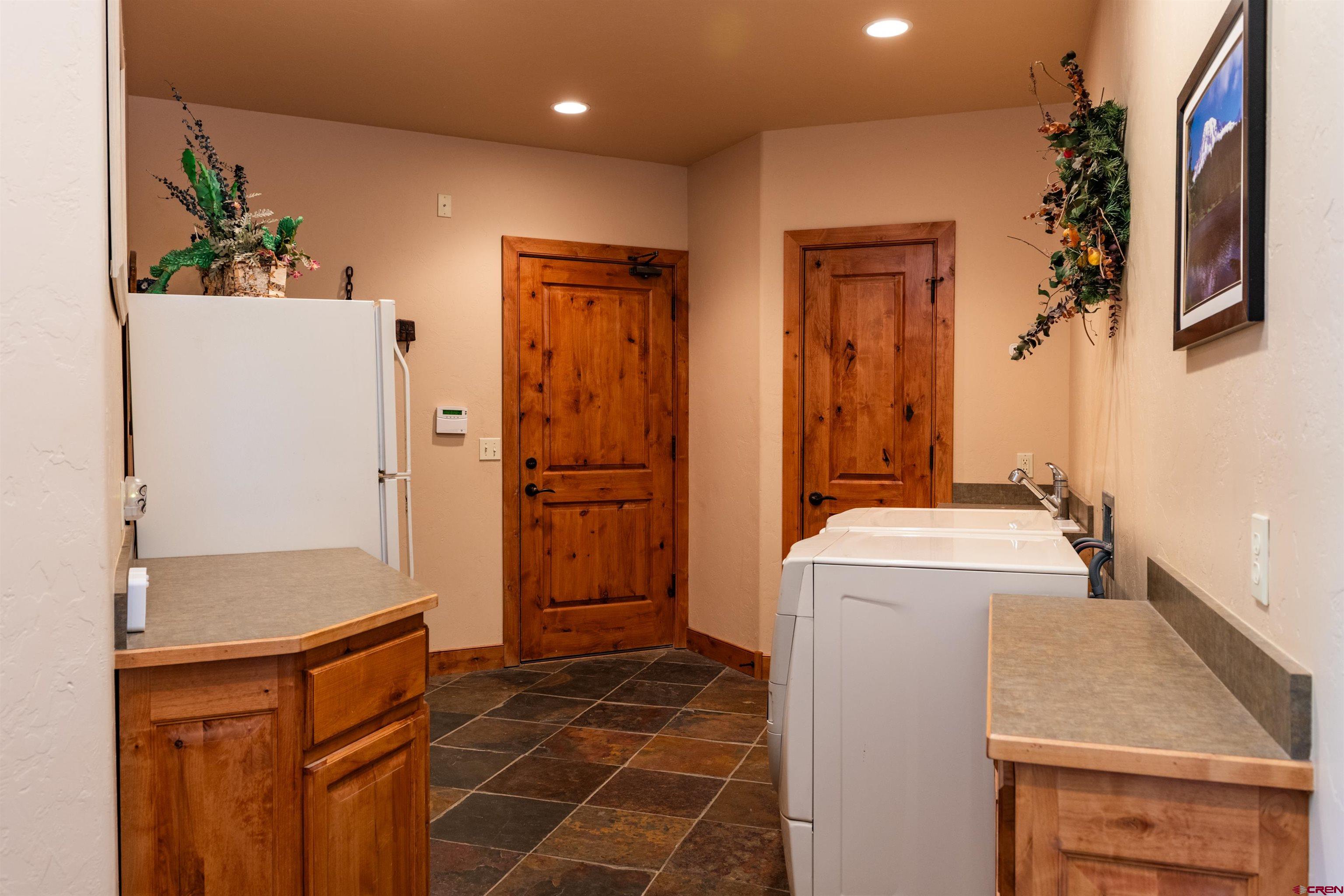 2550 Destination Ranch Road Durango, CO 81301 - Photo 39 of 45 This room leads to the kitchen from the garage.