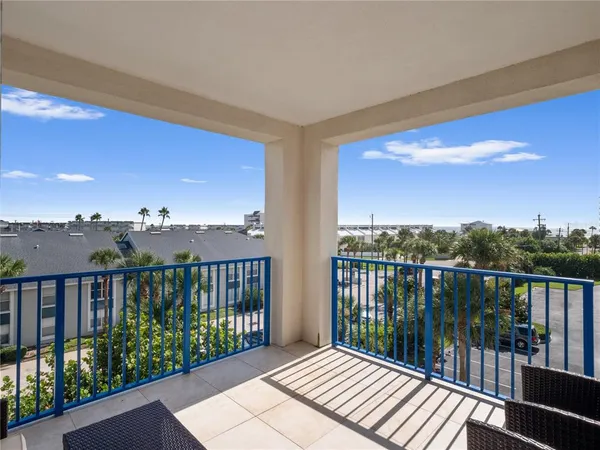a view of a balcony with city view