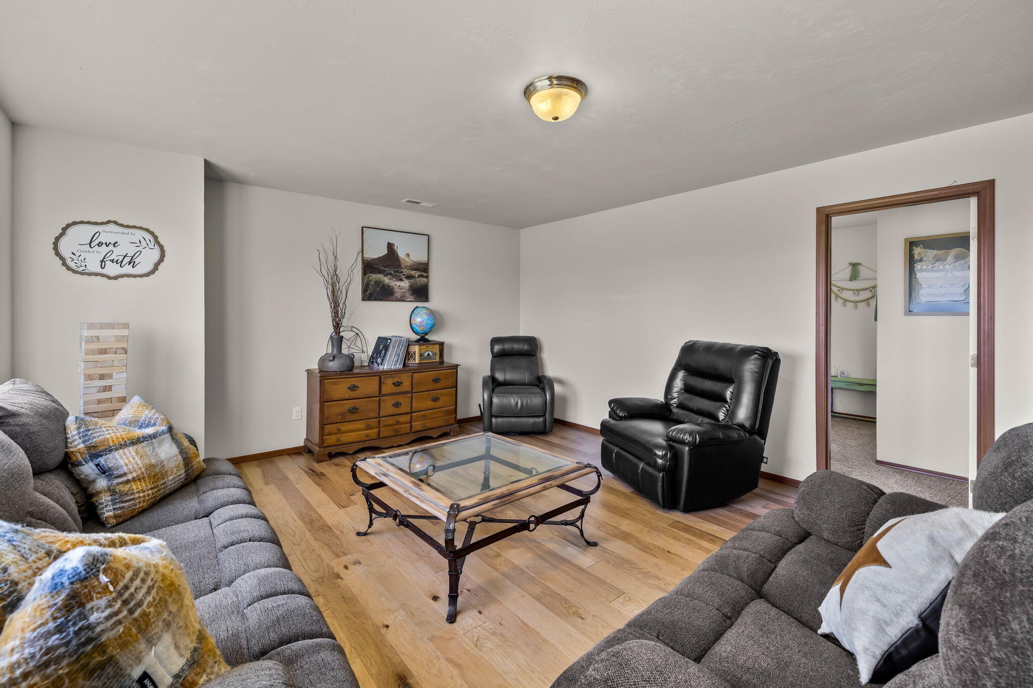 63639 Gentry Loop Bend, OR 97701 - Photo 23 of 40 a living room with furniture and a flat screen tv