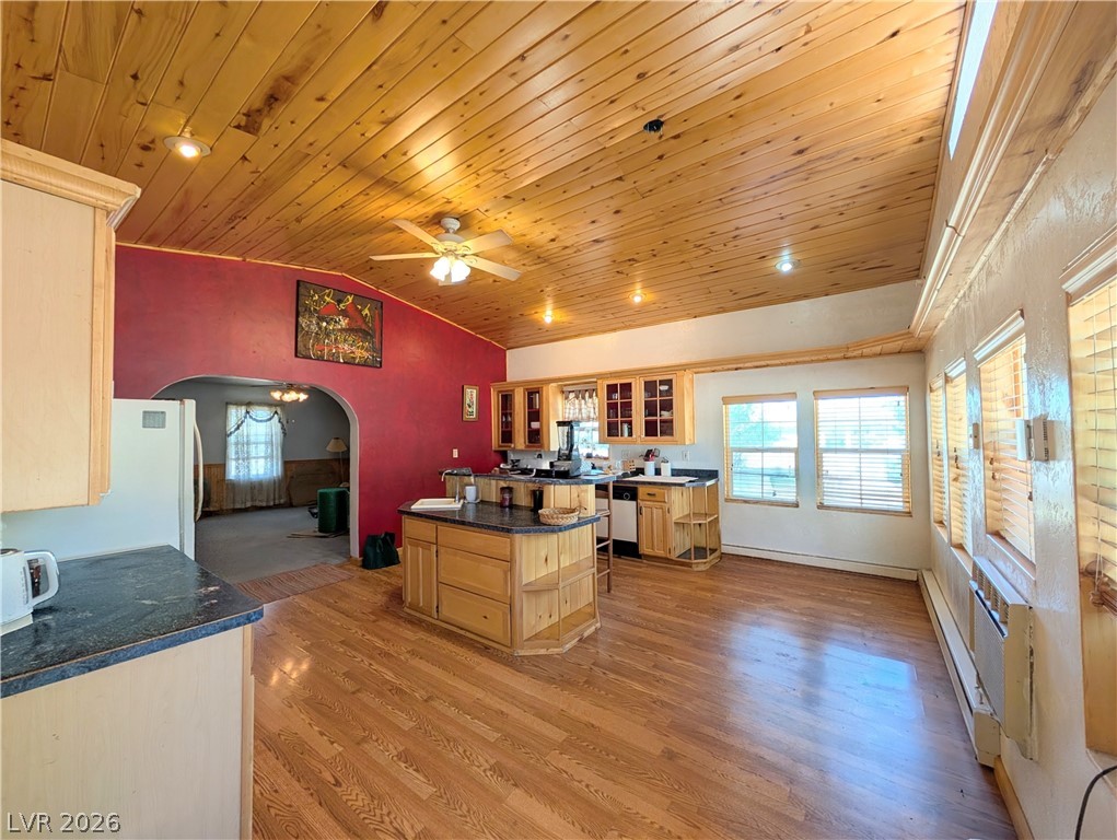 997 Phillips Street Panaca, NV 89042 - Photo 8 of 19 A rustic-inspired kitchen featuring wood plank ceilings and ample countertop space for culinary adventures.