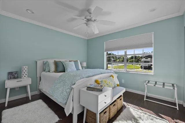 a bed room with a bed and a window