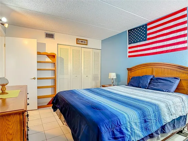 a room with a bed and a window