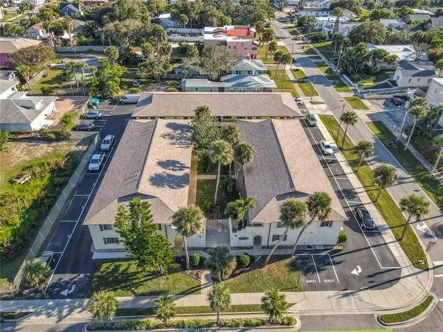 a view of a street with a garage