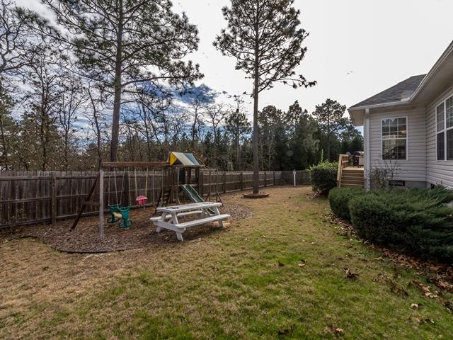 1310 Burning Tree Road Pinehurst, NC 28374 - Photo 22 of 27 Fenced backyard
