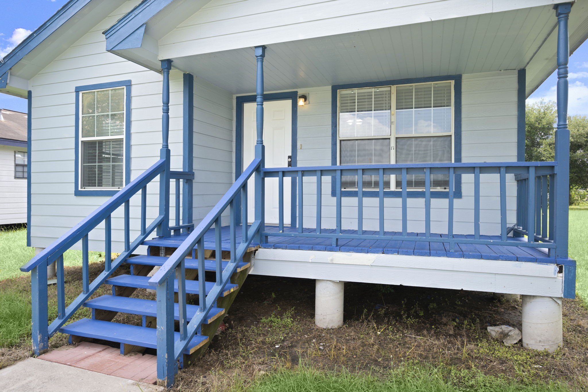 1935 1st Street Hempstead, TX 77445 - Photo 5 of 29 a view of two chairs in a balcony