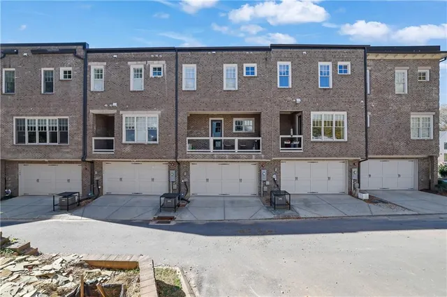 a view of a building with a street