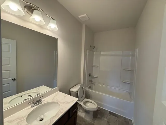 a bathroom with a toilet