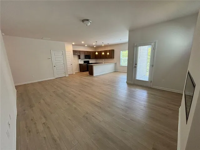 a view of an empty room and window