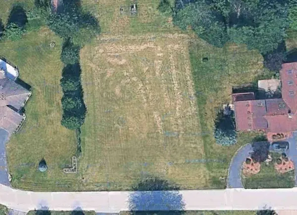 an aerial view of residential house with outdoor space