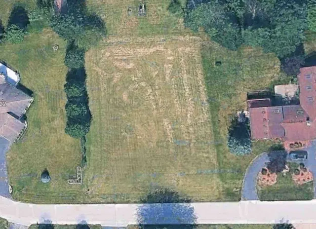 an aerial view of residential house with outdoor space