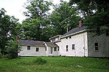 Viets Road Sandisfield, MA 01255 - Photo 2 of 2 a view of a house with a yard and large trees
