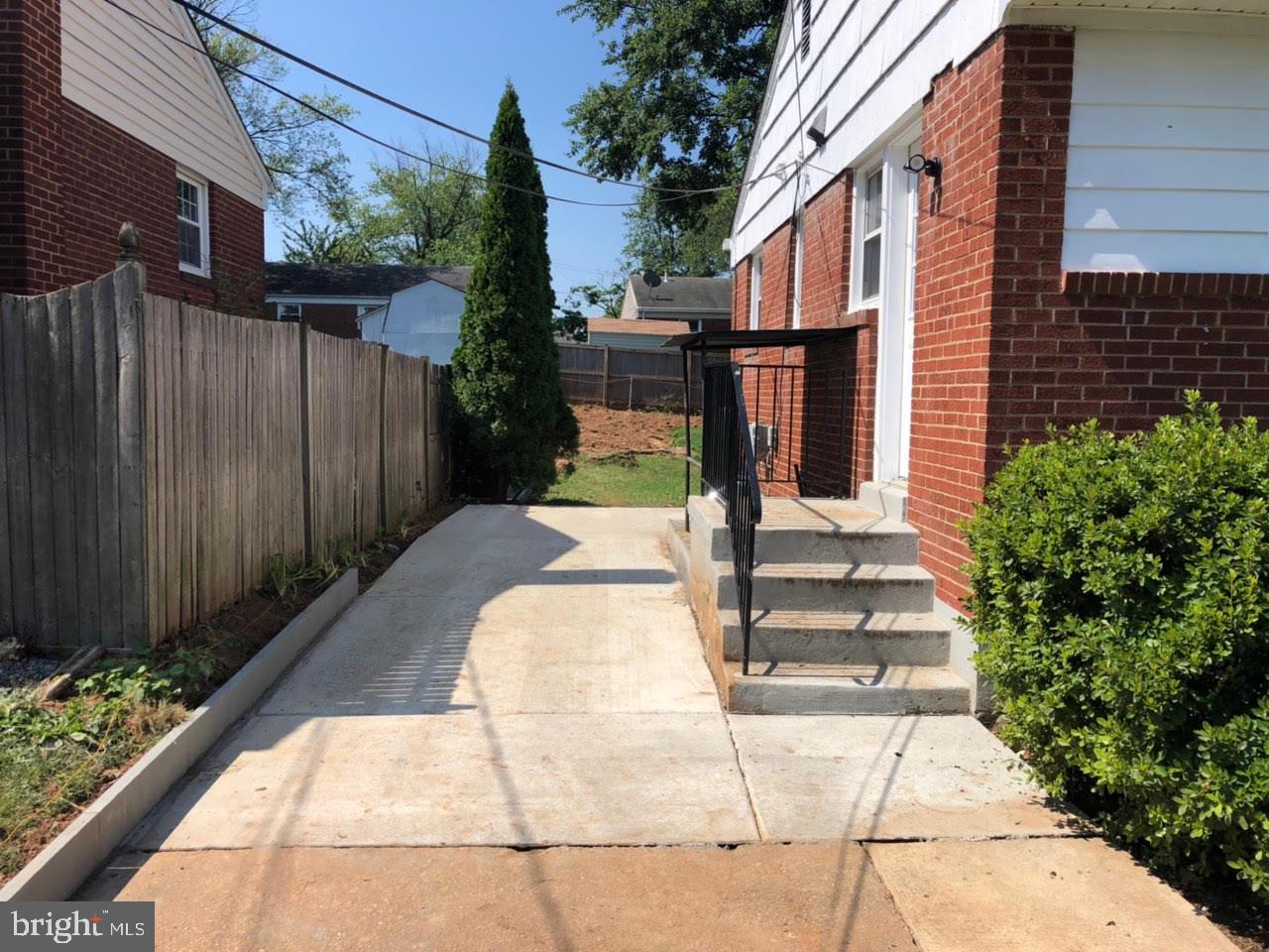 6408 Winnepeg Road Bethesda, MD 20817 - Photo 13 of 14 a view of a pathway with a backyard