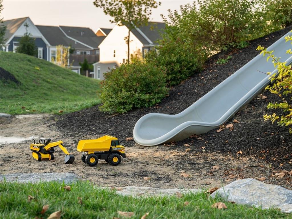 4014 Benton Way Bridgeville, PA 15017 - Photo 16 of 18 a view of a backyard with plants and a patio