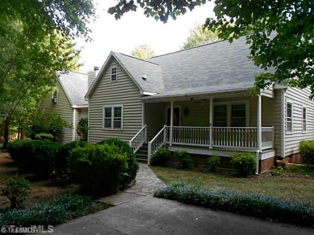 7905 Grey Fox Road Oak Ridge, NC 27310 - Photo 1 of 16 Exterior Front. Great landscaped front.