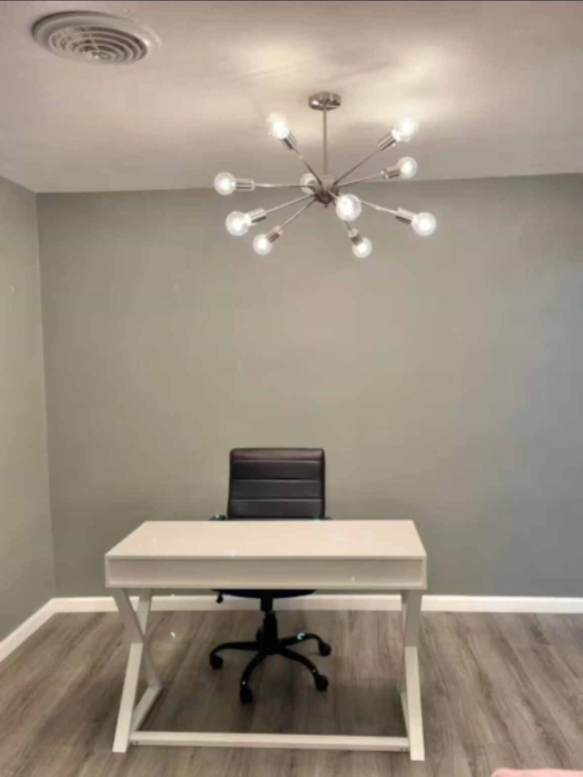 1908 North 16th Street Orange, TX 77630 - Photo 11 of 18 a room with a table chairs and wooden floor