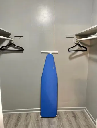 a view of a room with rack on the wall