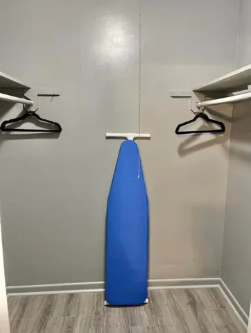 a view of a room with rack on the wall