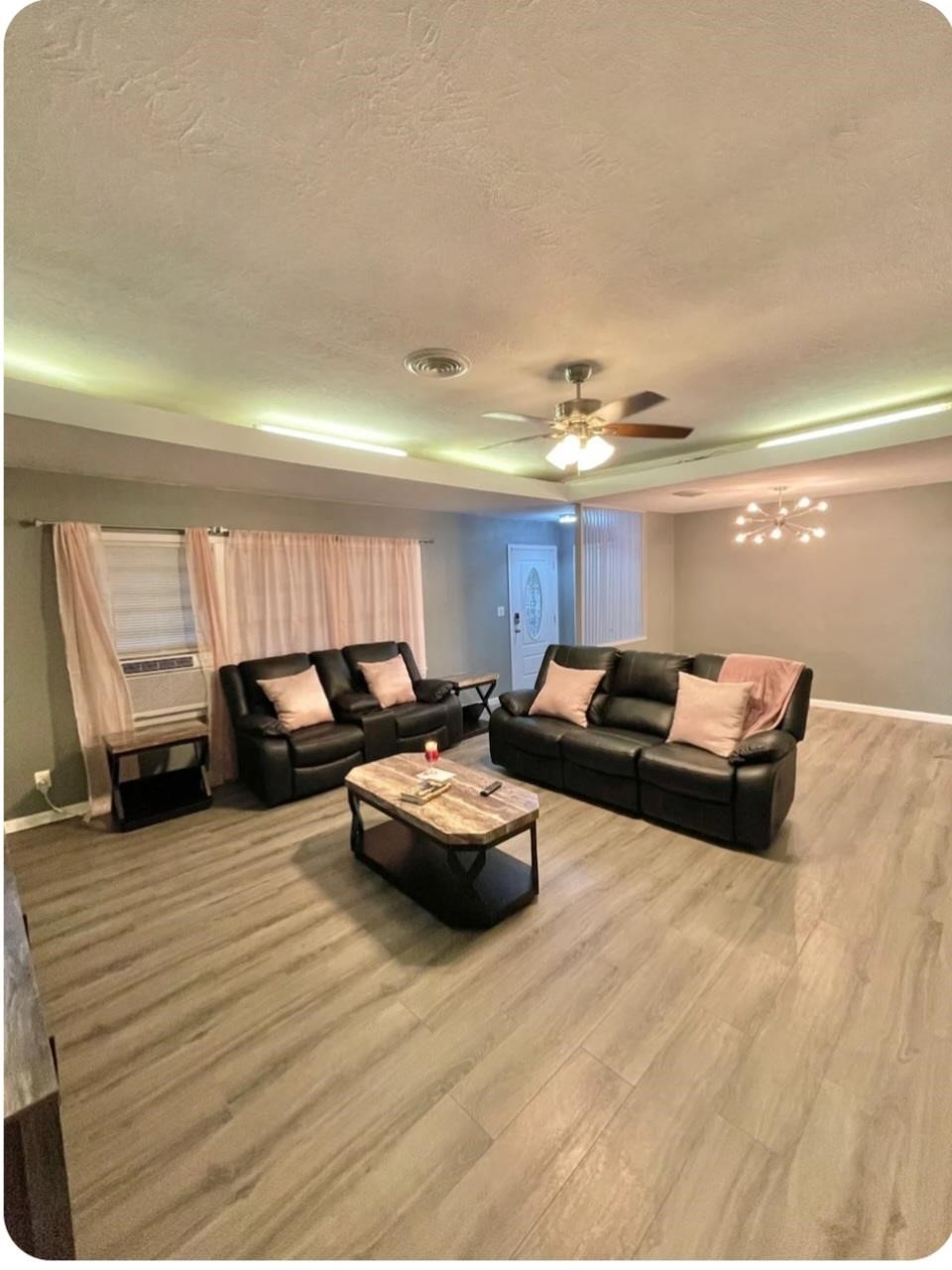 1908 North 16th Street Orange, TX 77630 - Photo 7 of 18 a living room with furniture and a large window