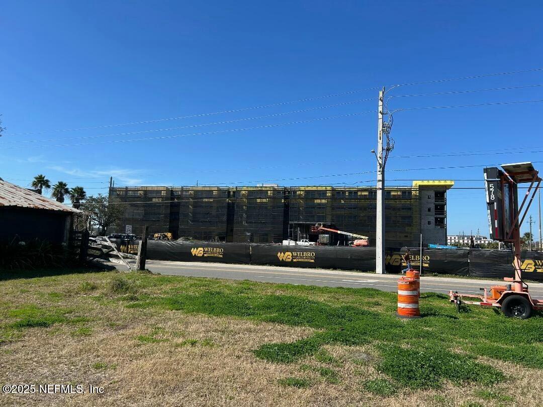 115 La Quinta Place St. Augustine, FL 32084 - Photo 12 of 32 a view of a garden with lawn chairs