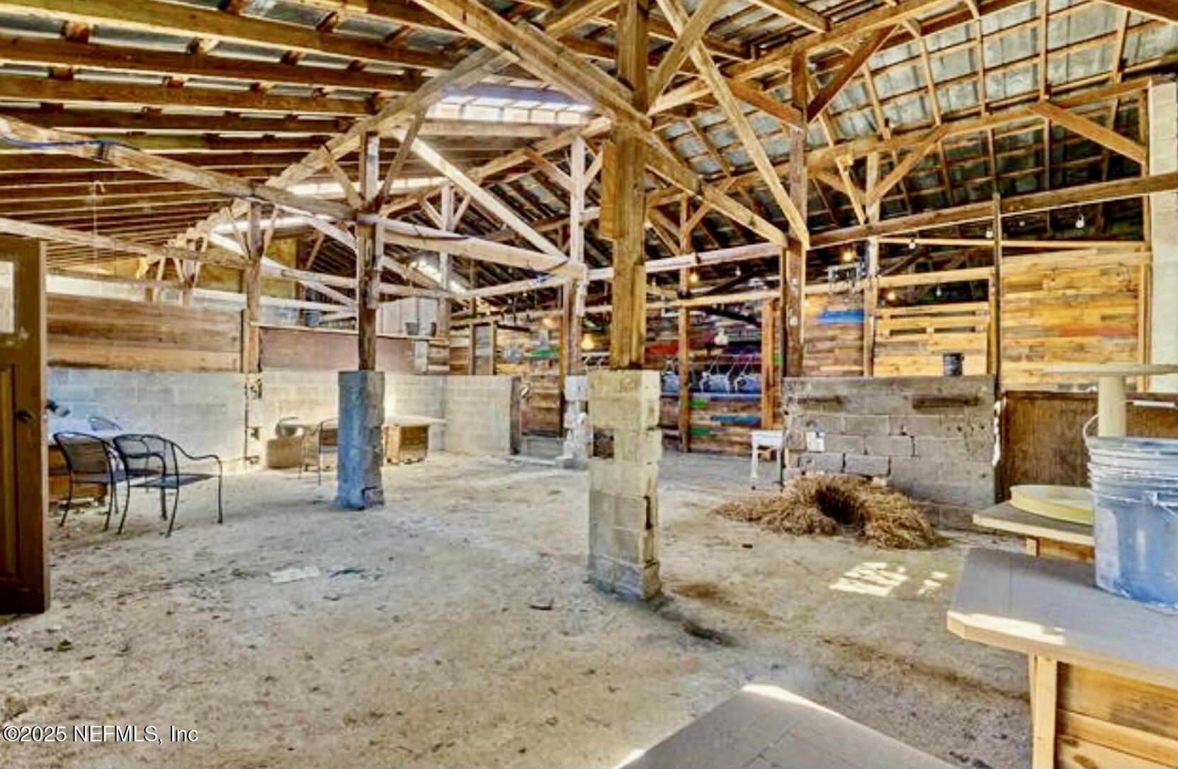 115 La Quinta Place St. Augustine, FL 32084 - Photo 29 of 32 a view of a patio with table and chairs